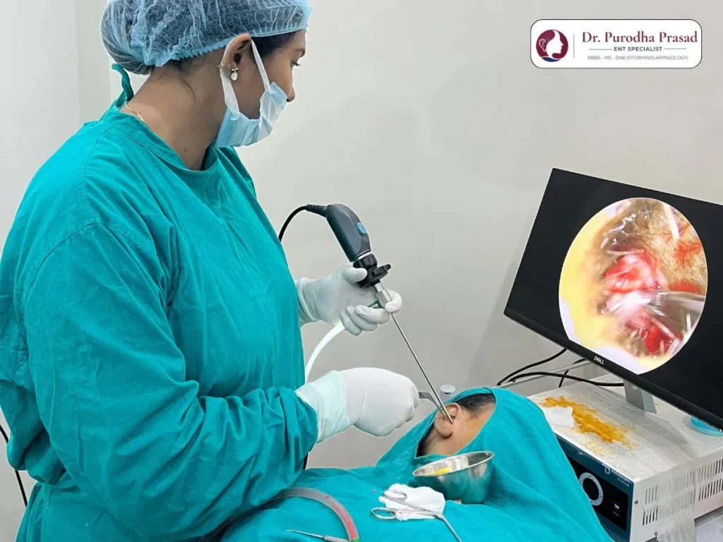 the doctor performing the ear procedure