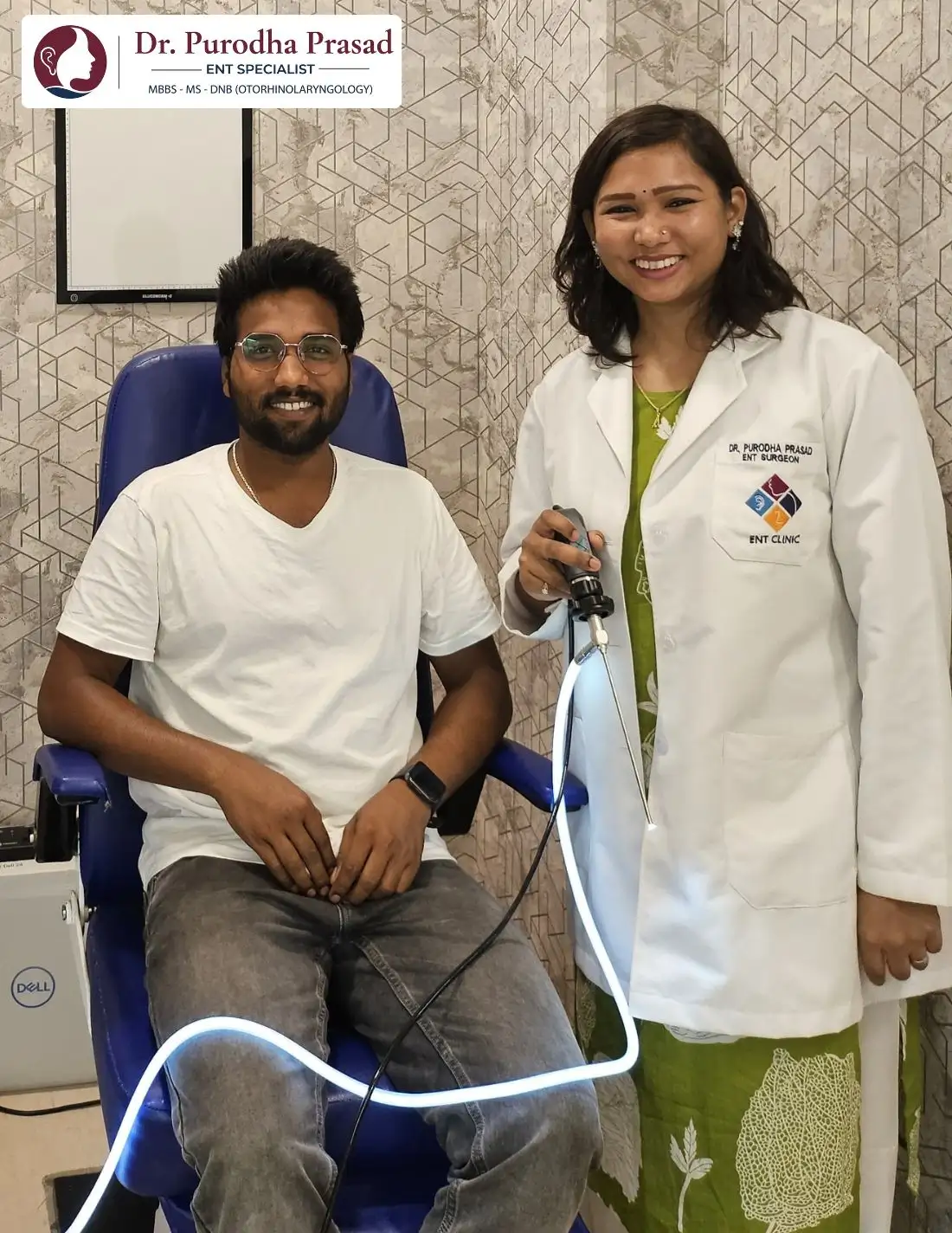 Dr. Purodha Prasad along with Sinus Patient holding endoscope.