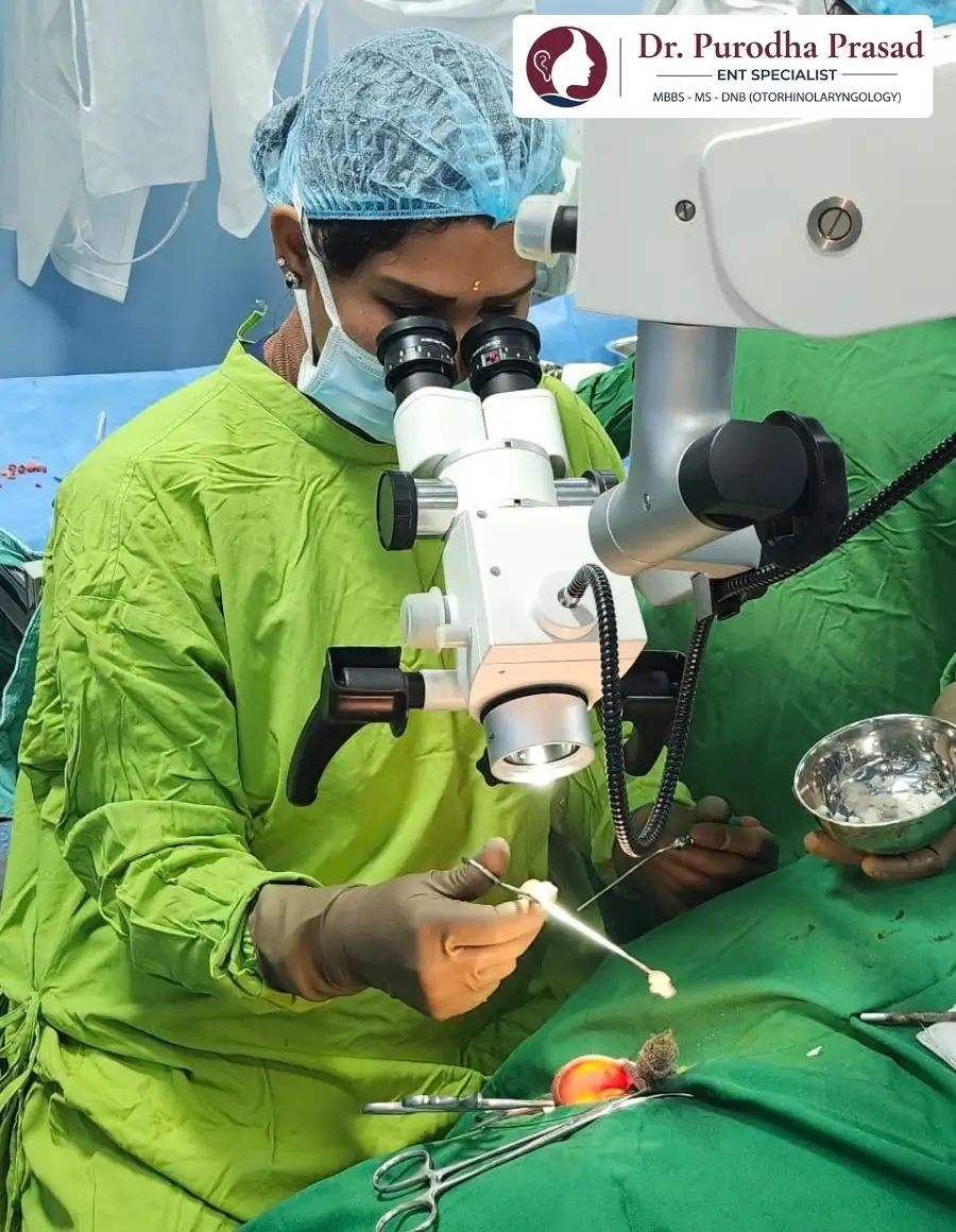 Dr. Purodha Prasad doing microscopic ear surgery in Delhi.