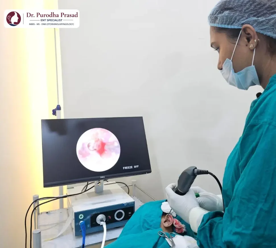 Dr. Purodha Prasad performing an ear endoscopic examination before myringotomy ear tube surgery in Delhi