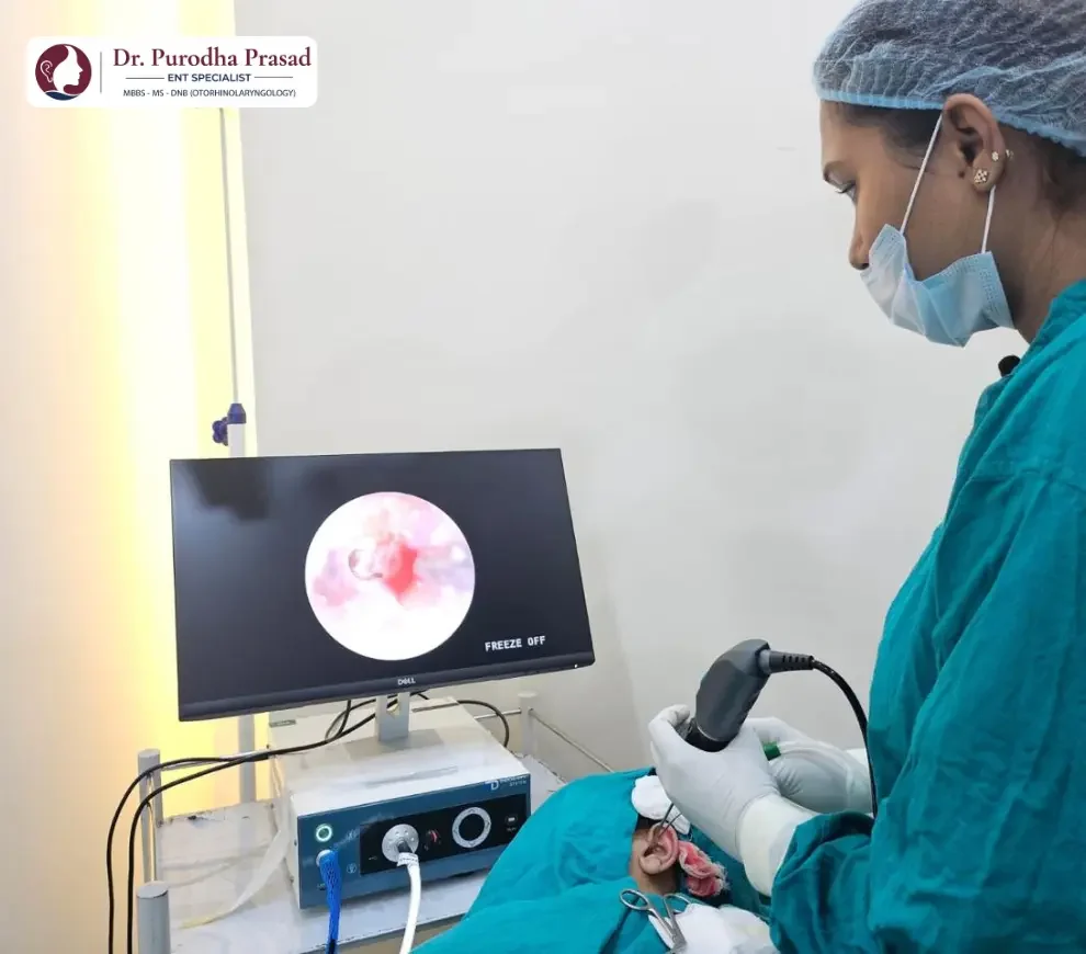 Dr. Purodha Prasad performing an ear endoscopic examination before myringotomy ear tube surgery in Delhi