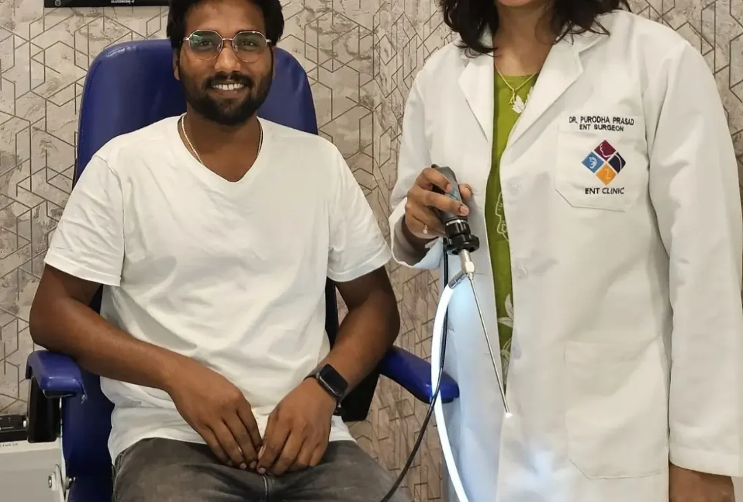 Dr. Purodha Prasad along with Sinus Patient holding endoscope.